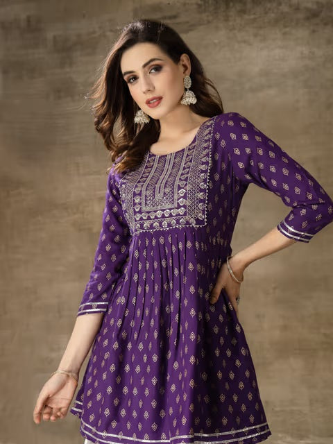 womens purple printed short kurta with white patiala salwar set